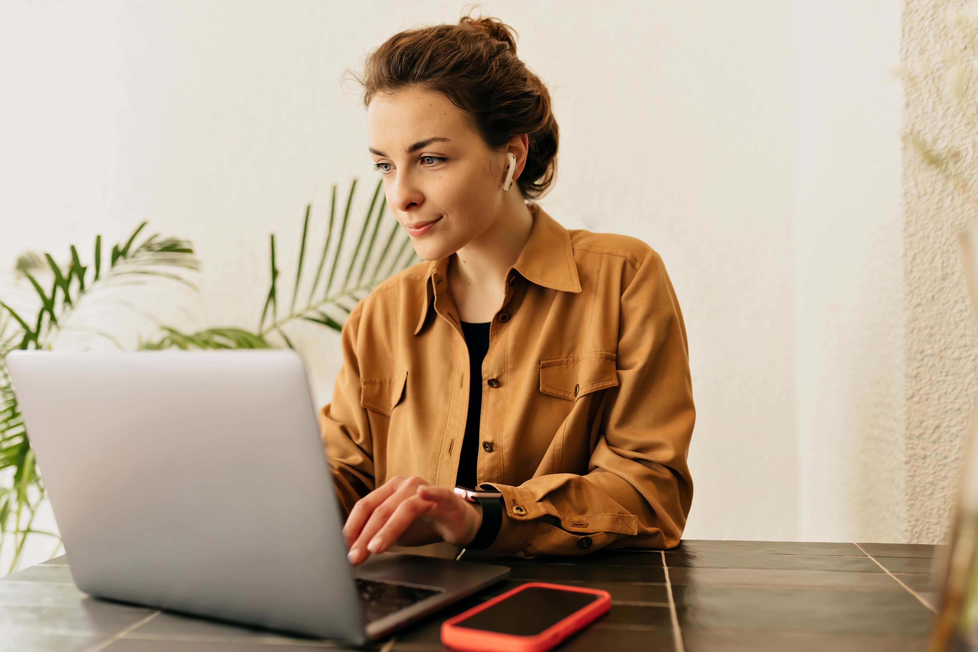 Professional woman working on a laptop